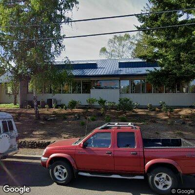 Thumbnail image of the front of a dentist office practice with the name Timber Kids Dentistry which is located in Ashland, OR