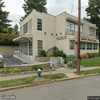 Thumbnail image of the front of a dentist office practice with the name Holistic Dental Center of NJ which is located in Millburn, NJ