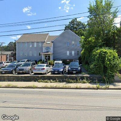 Thumbnail image of the front of a dentist office practice with the name Nandhavan Dental which is located in Stoneham, MA